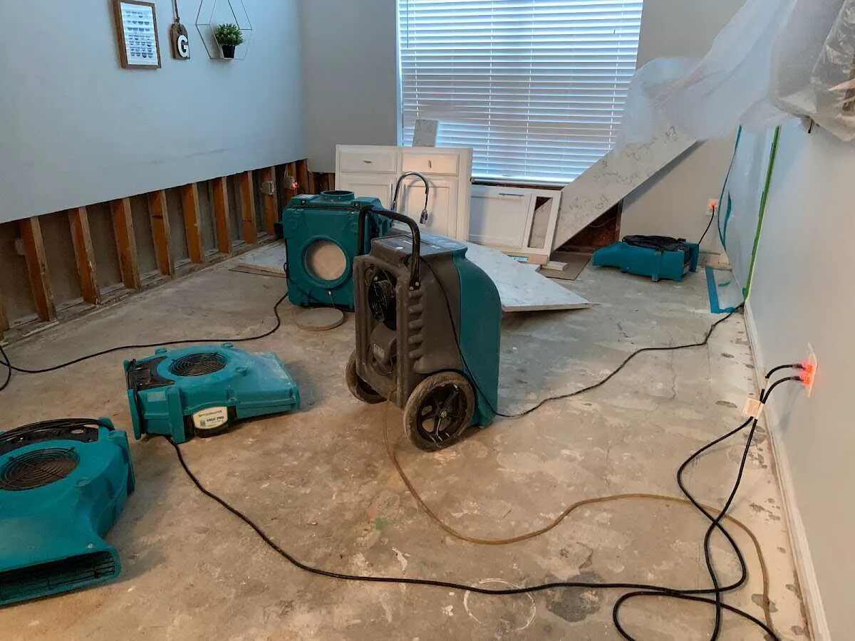 Dehumidifier in flood-cut room for Water Extraction & Removal in River Oaks